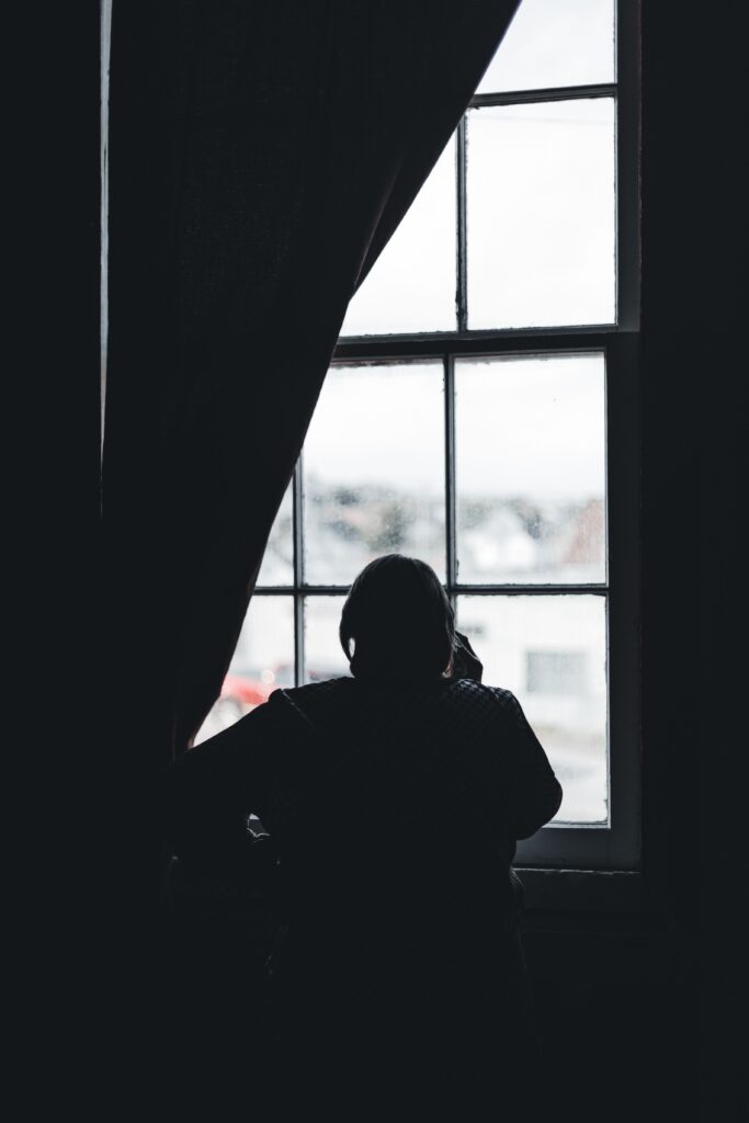 Person reflecting on why they feel lost in life and searching for direction.