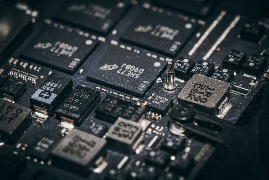 Close-up of a computer microchip illustrating the computational technology underlying AI systems.