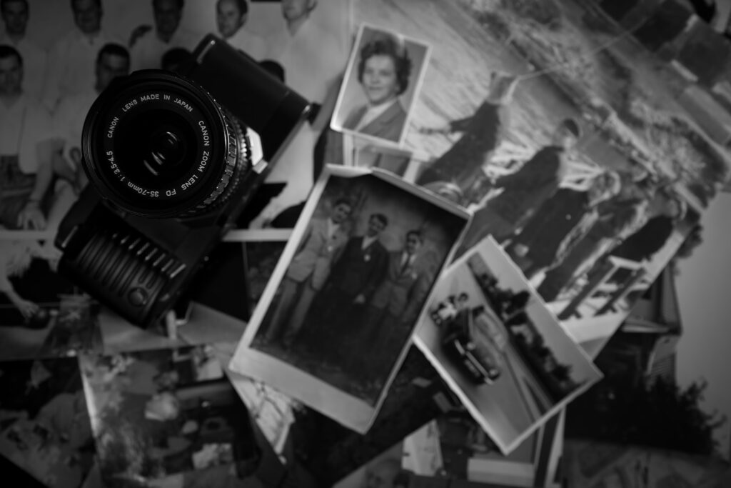 Old photographs representing personal memories and the different stages of identity.